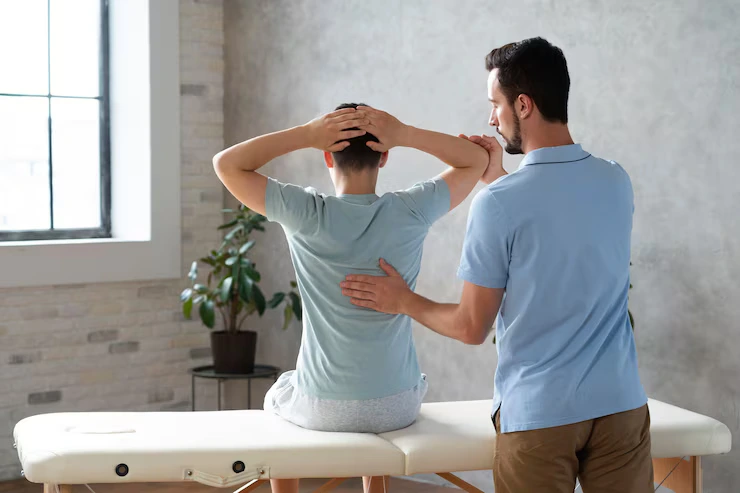 medium-shot-man-helping-patient-physiotherapy_23-2149047562 (1) (1)